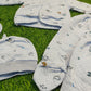 5-Piece Baby Clothing Set with Quilted Jacket, Footed Pants, Cap, and Bib